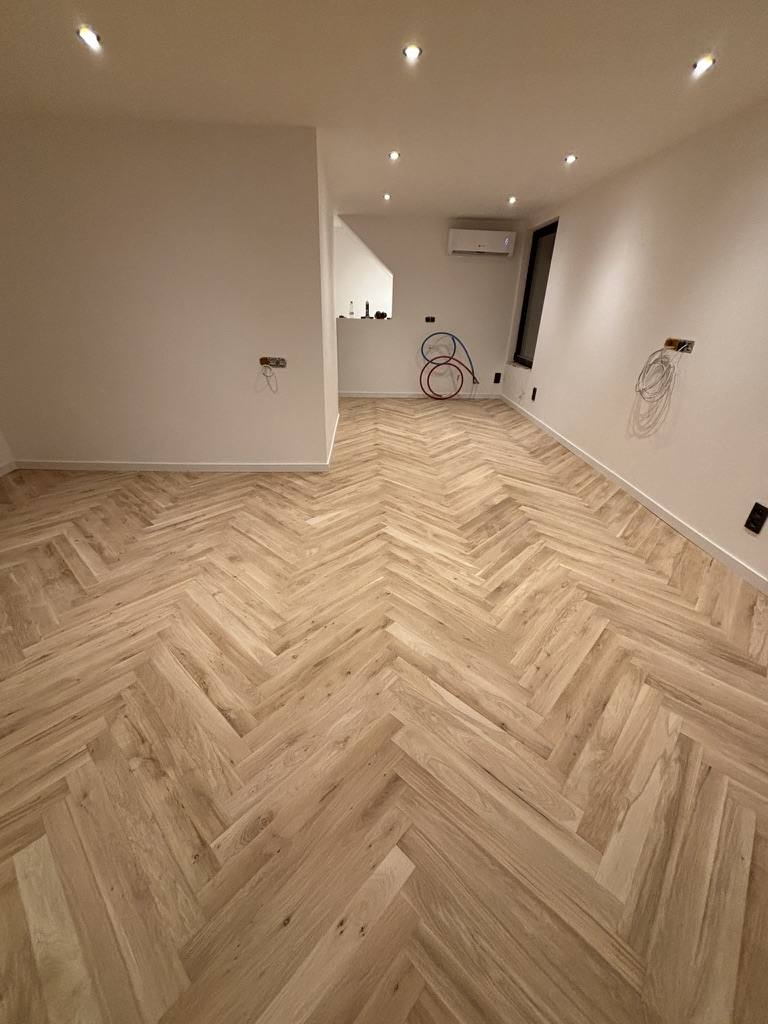 Herringbone parquet in a converted attic space